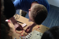 Tom running Makey Makey workshop